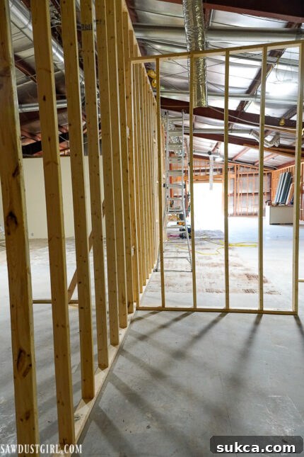 Progress shot of The Lodge's interior framing Interior view of the partially framed upstairs