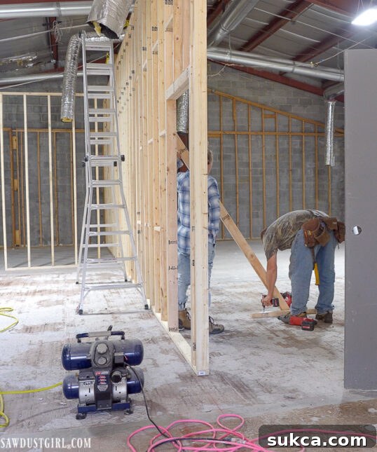 Building the framework for The Lodge Constructing wall sections for the upstairs framing