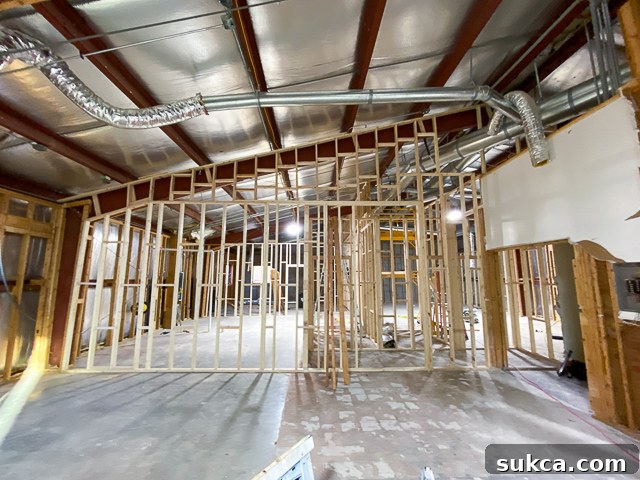 A section of the upper wall completed, showcasing the intricate framing work