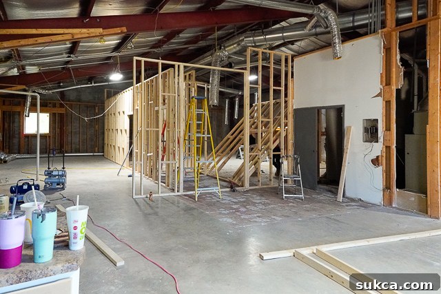 Framing work on the right side of The Lodge, defining the new studio layout