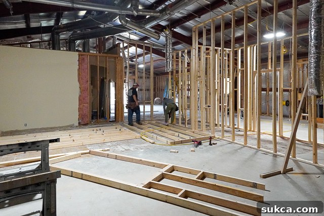 Close-up of framing details in the studio area, showing new wall construction