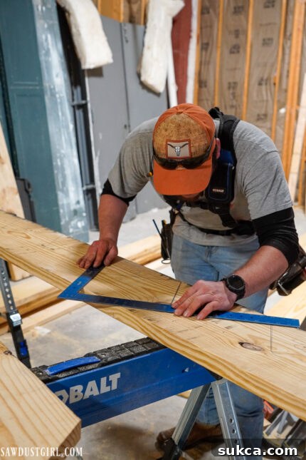 Temporary wooden stairs leading to the new loft area, constructed from 2x4s, facilitating access during construction, a common sight in building stairs projects.