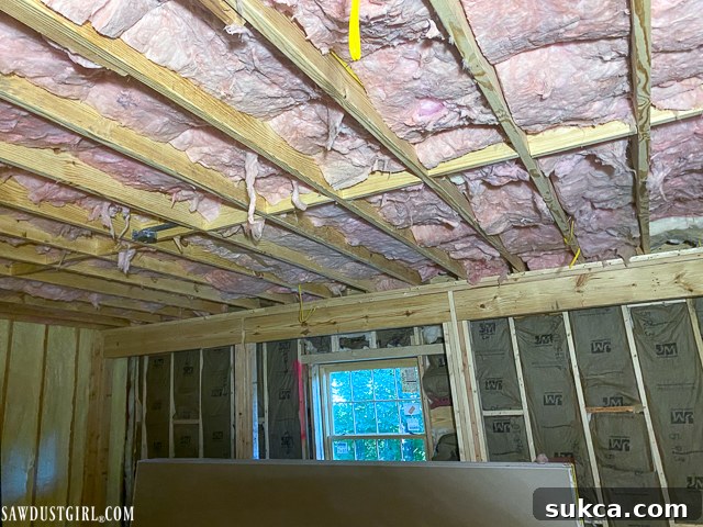 Lodge Drywall Installation Update 5 5 Insulation installation in a bedroom ceiling
