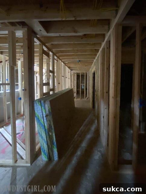 Lodge Drywall Installation Update 5 9 Drywall sheets neatly distributed throughout a room