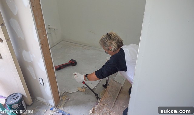Torn out experimental concrete floor in powder room