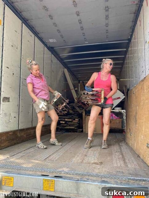 a truck full of old farm lumber and tools