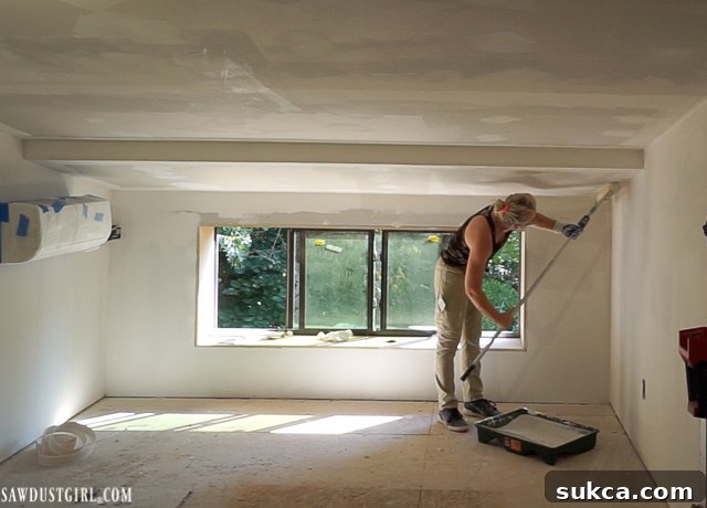 Drywall installation in the loft guest suites