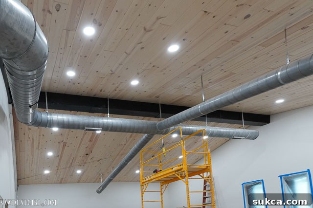 Another view of the faux metal bracket, showing its textured and painted finish.