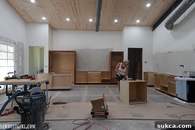 Island cabinets being aligned