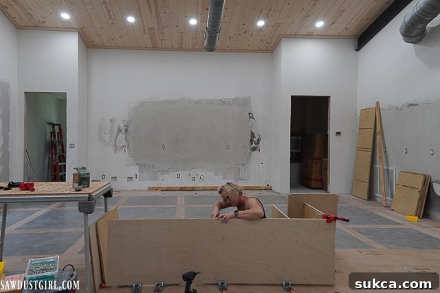 Custom cabinet for built-in ovens under construction