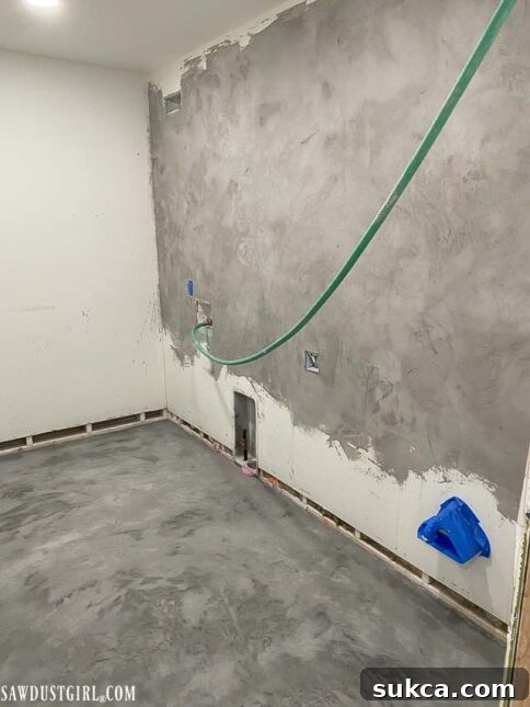 Laundry room walls with a smooth concrete overlay finish
