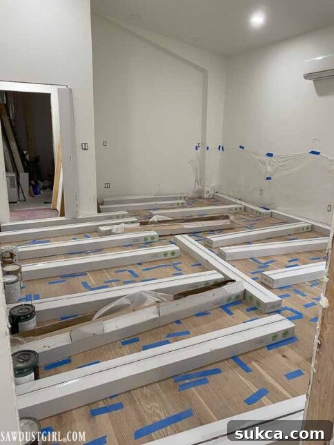Master bedroom with new flooring and a temporary bed setup