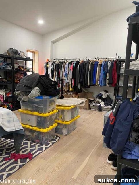 Temporary closet setup within the master bedroom space