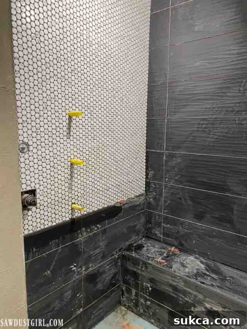 Close-up of newly tiled bathroom floor