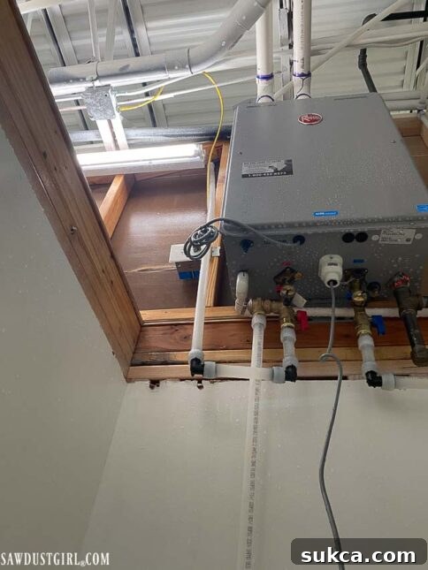 New water heater and pressure gauge installed after flood