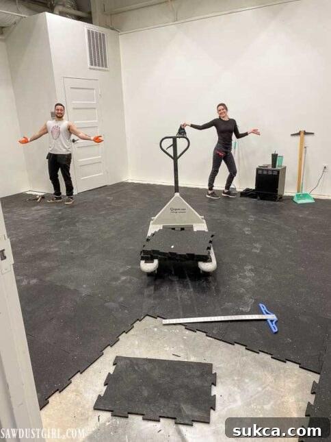 Installing durable rubber flooring in the new home gym
