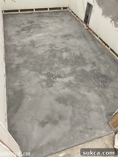 Textured concrete finish on a pantry backsplash