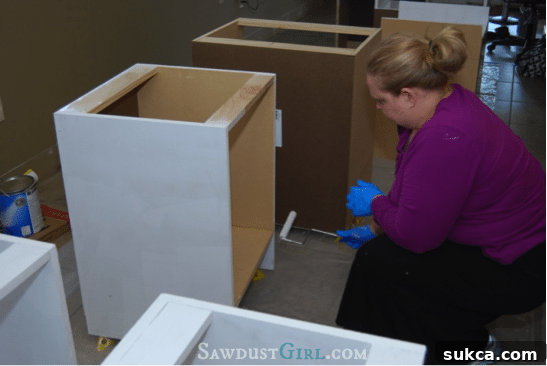 First coat of primer applied to Cara Collection cabinet bases