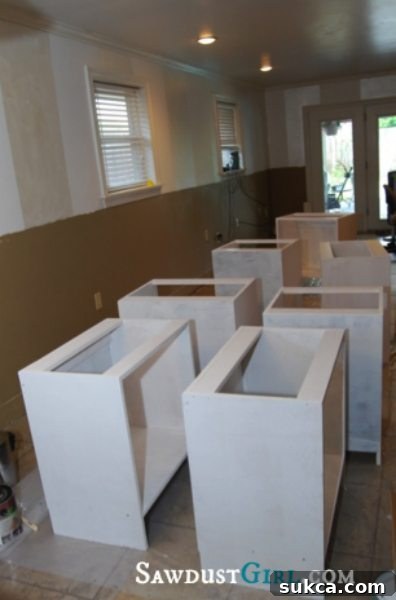Taking a break after priming custom built-in cabinets