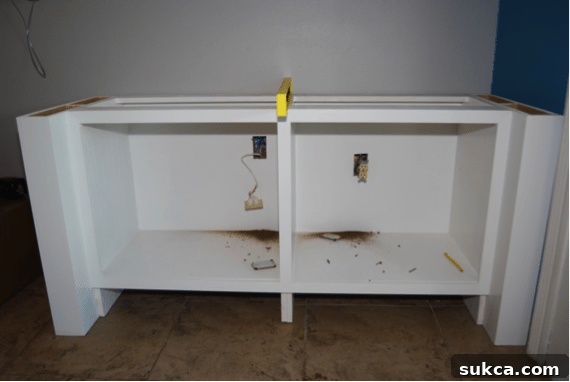 Marking and cutting electrical outlets in custom cabinetry