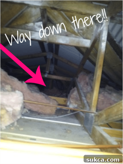Kristy Prepares for Attic Access in her Built-in Project Building bedroom cabinets and attic exploration for wiring