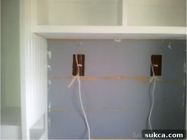 Wiring Preparation for Built-ins Running electrical wires for built-in lighting in bedroom