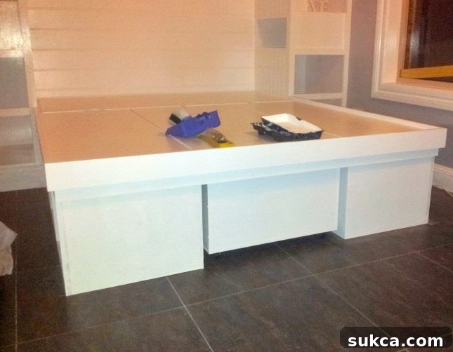 Custom bedroom storage solution Finished custom bedroom built-ins with integrated drawer.