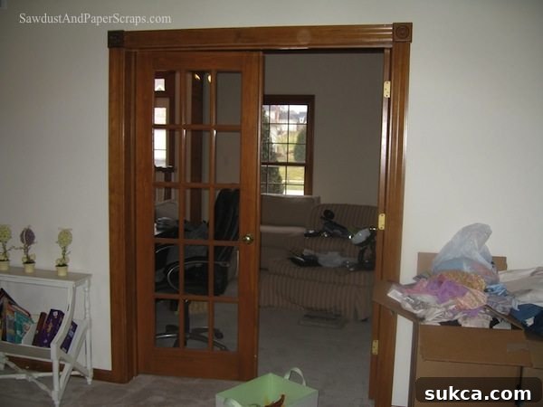 Entry to the library or living area in Illinois home before renovation