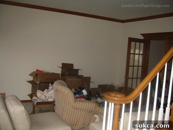 Ugly den in Illinois house before home transformation, showing outdated decor