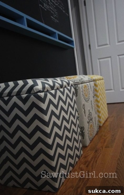 Upholstered Storage Bench Tutorial from @Sawdust Girl - A finished storage bench, showcasing its clean lines and practical design.