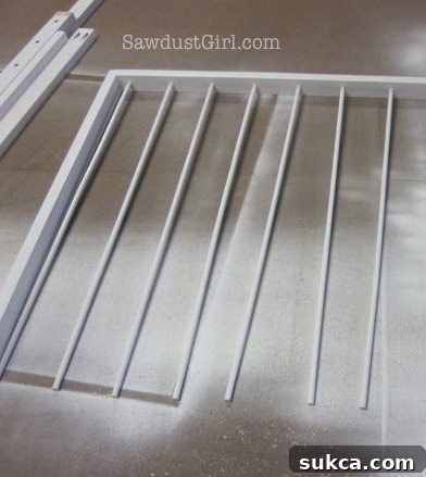 All dowels inserted into one side of the drying rack frame.