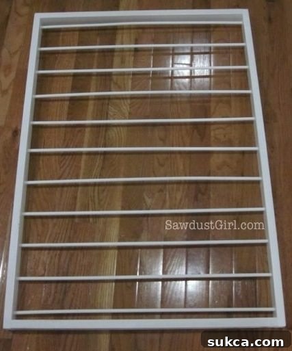Finished frame of a hanging drying rack, without netting.